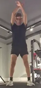 Showing the Arm Crossover Swing exercise