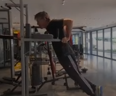 showing the bar dip exercise for Triceps, Upper Body, Chect and Core