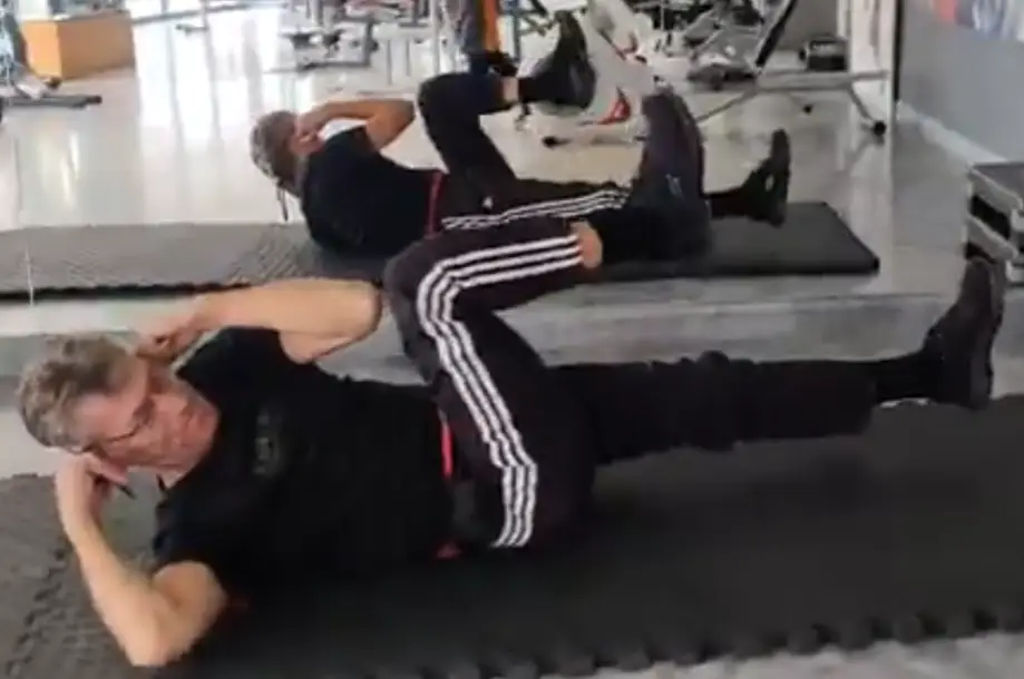 showing the Bicycle Crunch Pilates exercise
