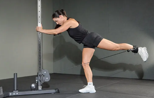 showing the cable glute kickback gym exercise form