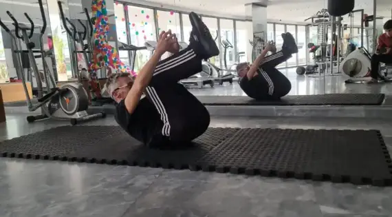 Showing Mojoh doing the modified Cocoon gym exercise