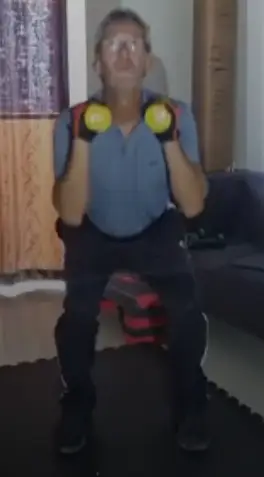 showing the dual dumbbell squat exercise