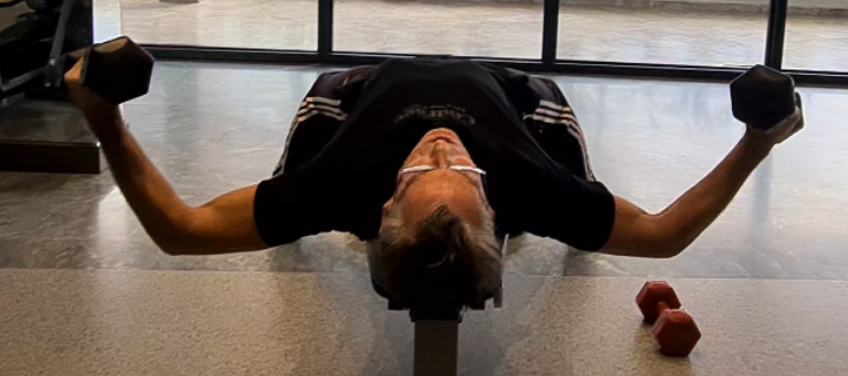 showing the Dumbbell Fly gym exercise
