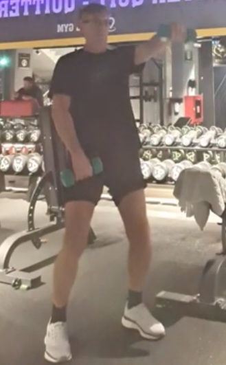 showing the alternating dumbell front raise