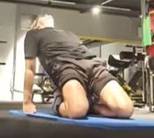 showing the Kneeling Quad Stretch Pilates Exercise