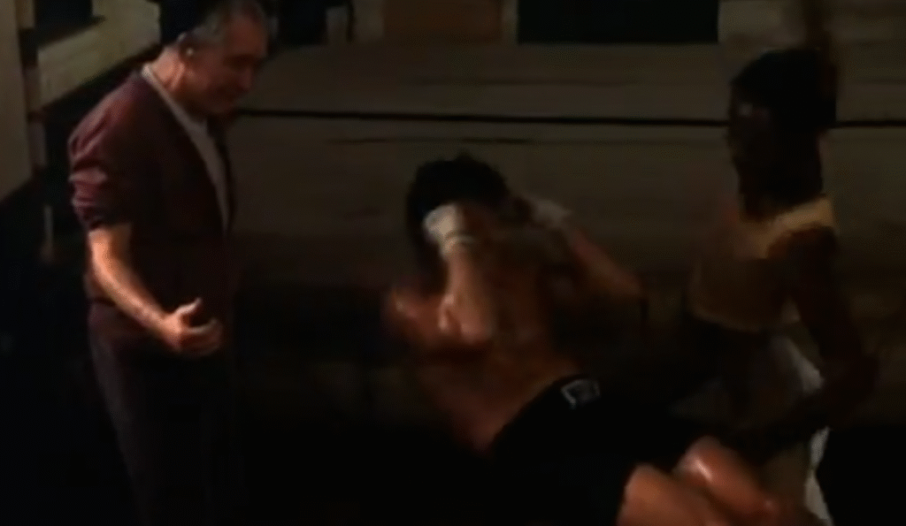 Showing a scene from Rocky with a punch to the ABS