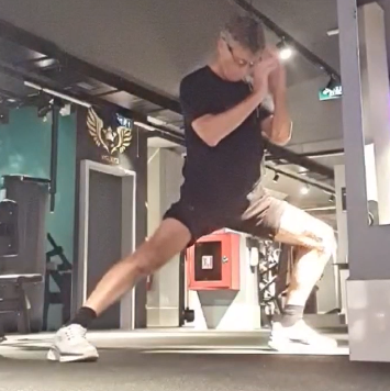 showing the Side Lunge (Groin Stretch) exercise