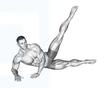 Showing the top position of the Side Lying Scissors Pilates exercise