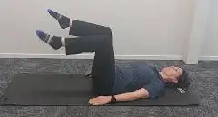 Showing the Pilates exercise called Table Top Toe Tap