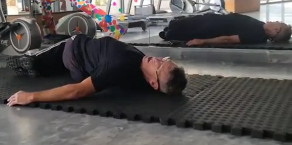 Showing the Lying Hip Twist Pilates Exercise