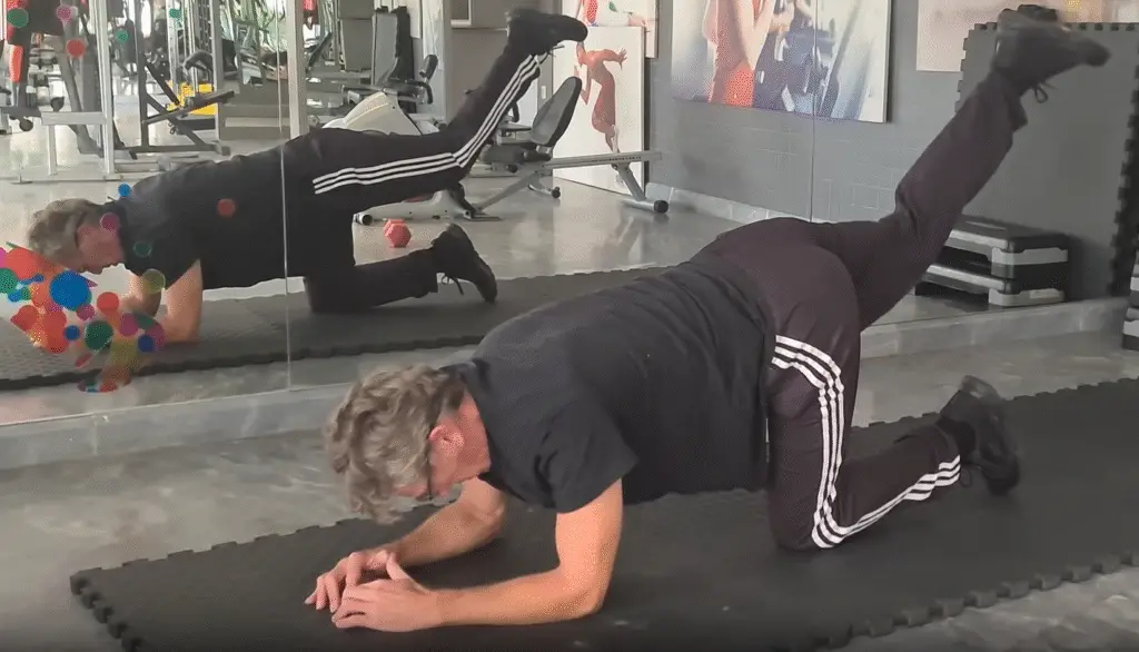 showing the Dionkey Kick Pilates Exercise