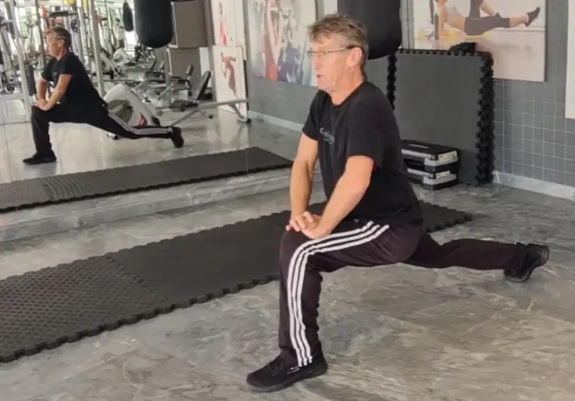 Showing the Forward Lunge stretch exercise