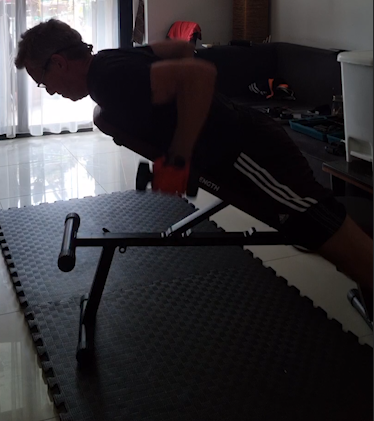 Showing the Incline chest supported bench dumbbell row