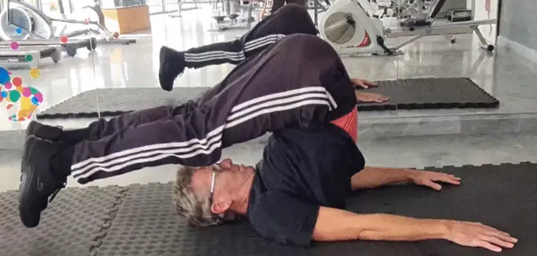Showing a still image from my Plow video of this brilliant and ancient key Pilates exercise which form part of the Mojoh Method Pilates Lessons